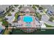 Aerial view of community pool and surrounding area at 2606 Lodi Cir # 105, Kissimmee, FL 34746