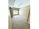 Spacious carpeted bedroom with large window and ceiling fan at 2606 Lodi Cir # 105, Kissimmee, FL 34746
