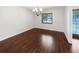 Bright dining room featuring hardwood floors and a chandelier at 509 Savona Ct, Altamonte Springs, FL 32701