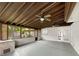 Spacious screened porch with ceiling fans and brick fireplace at 509 Savona Ct, Altamonte Springs, FL 32701