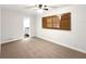 Bright bedroom featuring carpet flooring and plantation shutters at 509 Savona Ct, Altamonte Springs, FL 32701