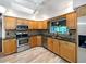 Updated kitchen features stainless steel appliances and granite countertops at 509 Savona Ct, Altamonte Springs, FL 32701
