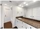 Bathroom with granite countertop and white cabinets at 509 Savona Ct, Altamonte Springs, FL 32701