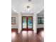 Bright entryway with hardwood floors and double doors at 509 Savona Ct, Altamonte Springs, FL 32701