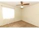 Bedroom with ceiling fan and window with sheer curtains at 1264 Village Way, Orlando, FL 32807