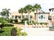 Resort-style clubhouse with seating and landscaping at 1864 Caribbean View Ter, Kissimmee, FL 34747