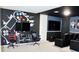 Fun game room featuring a gaming setup, large screen TV, and themed wall art at 1864 Caribbean View Ter, Kissimmee, FL 34747