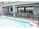 Enjoy this refreshing pool and spa with safety fence at 1864 Caribbean View Ter, Kissimmee, FL 34747