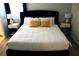 Bedroom with king-size bed and nightstands at 1864 Caribbean View Ter, Kissimmee, FL 34747