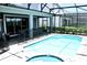 Inviting pool with spa and safety fence at 1864 Caribbean View Ter, Kissimmee, FL 34747