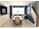 Bright dining room with large table and chairs at 1864 Caribbean View Ter, Kissimmee, FL 34747