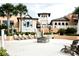 Community area with fire pit, seating, and nearby clubhouse at 1864 Caribbean View Ter, Kissimmee, FL 34747