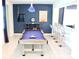 Game room with pool table and bar area at 1864 Caribbean View Ter, Kissimmee, FL 34747