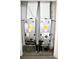 Image shows a well-maintained HVAC system with two Carrier units at 1864 Caribbean View Ter, Kissimmee, FL 34747