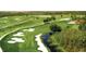 Aerial view of championship golf course with lush greens at 1411 Clubman Dr, Davenport, FL 33896