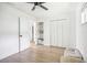Spacious bedroom with ample closet space and wood-look flooring at 11130 Park Ave, Windermere, FL 34786