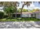 House exterior showcasing curb appeal and landscaping at 11130 Park Ave, Windermere, FL 34786