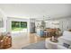 Open concept kitchen with island, stainless steel appliances, and access to backyard at 11130 Park Ave, Windermere, FL 34786