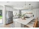 Modern kitchen with stainless steel appliances and white shaker cabinets at 11130 Park Ave, Windermere, FL 34786
