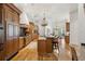 Open kitchen boasts an island with seating and high end finishes at 11261 Macaw Ct, Windermere, FL 34786