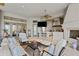 Outdoor living space with kitchen, fireplace, and seating area at 11261 Macaw Ct, Windermere, FL 34786