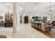 Elegant dining room featuring a large table, chandelier, and built-in hutch at 11261 Macaw Ct, Windermere, FL 34786