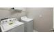 Bright laundry room with Whirlpool washer and dryer at 1411 Clubman Dr, Davenport, FL 33896