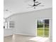 Spacious living area with sliding glass doors leading to the backyard at 656 Koala Ct, Kissimmee, FL 34759
