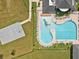 Community pool with lap lanes, water slide, and surrounding lounge area at 656 Koala Ct, Kissimmee, FL 34759