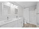 Clean bathroom with double vanity and a shower/tub combo at 656 Koala Ct, Kissimmee, FL 34759
