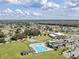 Aerial view of community center with pool and basketball court at 656 Koala Ct, Kissimmee, FL 34759