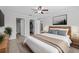 Spacious main bedroom with plush bedding and large window at 656 Koala Ct, Kissimmee, FL 34759