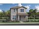 Two-story Craftsman style home with neutral siding and landscaping at 2436 Cedar Rose St, Apopka, FL 32712