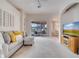 Relaxing living room featuring a sectional sofa and access to backyard at 511 Pineloch Dr, Haines City, FL 33844