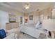 Bright main bedroom with a king bed, ample closet space, and access to the patio at 511 Pineloch Dr, Haines City, FL 33844