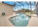 Enjoy this refreshing screened pool and spa at 511 Pineloch Dr, Haines City, FL 33844