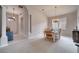 Bright dining room with a farmhouse table and chairs at 511 Pineloch Dr, Haines City, FL 33844