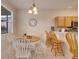 Charming dining area with a round table and wooden chairs at 511 Pineloch Dr, Haines City, FL 33844