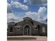 House exterior with gray paint and unique architecture at 511 Pineloch Dr, Haines City, FL 33844