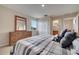 Spacious bedroom with dresser and large bed at 511 Pineloch Dr, Haines City, FL 33844