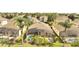 Aerial view of community with multiple homes and pools at 511 Pineloch Dr, Haines City, FL 33844