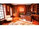 Spacious home office with built-in bookshelves and fireplace at 9726 Kilgore Rd, Orlando, FL 32836