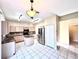 Kitchen with stainless steel appliances and an island at 122 Stone Gable Cir, Winter Springs, FL 32708