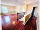 Versatile bonus room with hardwood floors and neutral walls at 122 Stone Gable Cir, Winter Springs, FL 32708