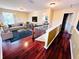 Spacious living room with hardwood floors and natural light at 122 Stone Gable Cir, Winter Springs, FL 32708