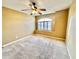 Spacious bedroom with neutral walls and window with blinds at 122 Stone Gable Cir, Winter Springs, FL 32708