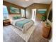 Main bedroom with vaulted ceiling and ensuite bathroom access at 122 Stone Gable Cir, Winter Springs, FL 32708