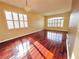 Bright dining room with hardwood floors and large windows at 122 Stone Gable Cir, Winter Springs, FL 32708