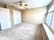 Charming bedroom with carpet flooring and double door closet at 122 Stone Gable Cir, Winter Springs, FL 32708