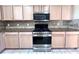 Modern kitchen features gas range and microwave at 122 Stone Gable Cir, Winter Springs, FL 32708